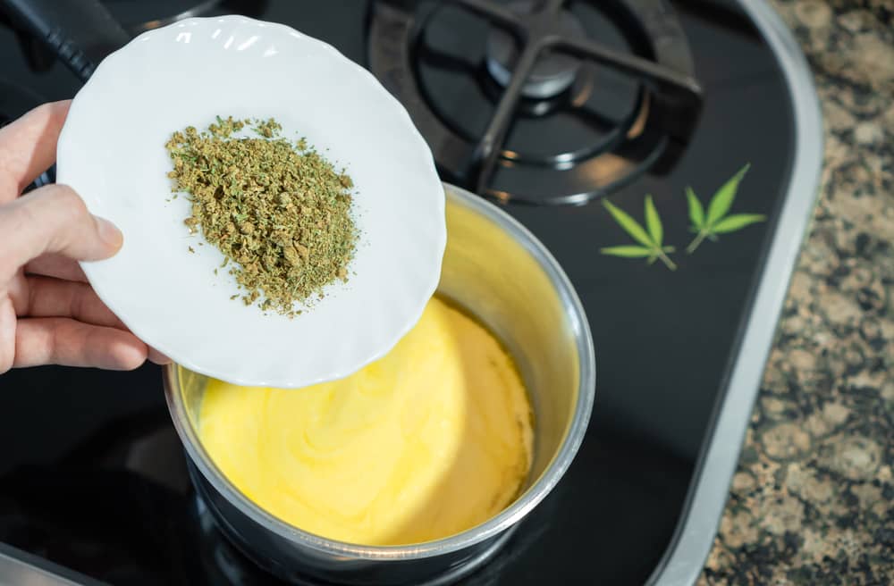 infuse-decarb-weed-in-butter adding decarb weed into melt butter